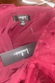 I bought this dress for a wedding, and before even trying on the dress, I noticed ripped seams on the sides of the dress and a hole as shown in the picture. The quality is very flimsy and poorly made even the tag came upside down. This dress can't even be repaired as the fabric is so weak and I had to hurry and quickly find something else to wear as it was close to the wedding date. It was a big waste of money and I don't recommend buying this dress if you want substantial items. I even bought a second one to give it a chance but no difference in appearance with the quality of the fabric. Not something that should be worn, this is disappointing as I even bought it again as I liked the dress a lot. Lulu should be held accountable for quality-checking their products before sending them out to customers. It leaves a poor impression on the company when they send items like that. I can't even return this dress as it has been 30 days, but for the quality and presentation, I feel this is highly unfair and upsetting. - Maude L.