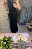 The materials feel like a good quality, and the fit is really great! All the reviews are so right the dress hugs in all the right places. Excuse the bad photos. - Kerigan B.