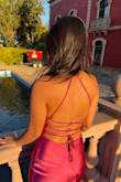 The perfect dress. Heavy satin that moves with your body and not at all see-through. Looks and feels a lot more expensive than it is.
I wore it as a halter instead of straps as shown but both styles work. 100% recommend. - Yasmin A.