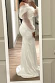 This Dress is Gorgeous and great quality. It fits perfectly (I ordered a small). Very flattering, wearing this for a civil ceremony, but will definitely get it steamed before hand - Madison F.