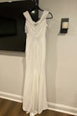 It's a nice dress but material is not what I expected. - Araceli C.