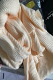 I ordered the dress after it was restocked and the color is NOT ivory. It's very clearly tinted yellow. - Tracy M.