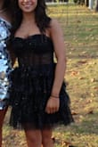 Dress was great and perfect for the occasion, I will say it was a little itchy and I had to pull it up quite a bit but that's to be expected with strapless. - Peyton W.