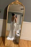 I chose this dress as the one! It's simple and gorgeous and exactly what I was looking for. I'll have to alter the top to fit my small chest but other than that it fits like a glove. I can't wait to wear it on my big day! - Kristen B.