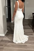 This dress is perfect, the material feels like a pretty good quality. - Melissa M.
