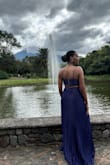 Beautiful dress that fits like a glove and is a really nice purple color. It is VERY long and I had to hold the bottom for the whole night even with heels on. - Erika P.