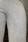 Had issues with the sizing; my chest is too small to keep it up, but I can't go down a size because my bottom is too large to go down, and this size is almost too tight on my rear. It also had a black stain when I took it out and tried it on. - Lauren R.