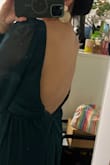 My size is normally S, but this dress is too small. I can't zip it up. - Erika U.