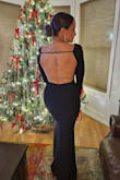 Very elastic material that fits the body perfectly. My measure is 5'1" and I had to fix it because it was very long even though I wore 3" heel shoes. I felt elegant, cute and very sexy. - Mailli T.