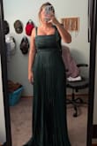 Material is so light and flattering. The bust is small but honestly it holds them in place and I don't need to wear a bra. If I sized up I think it would've been too lose in the chest that it wouldn't have been as flattering. It's a little long but this material is so giving that I might snip the bottom or go to a seamstress. Super flattering - Debbie F.