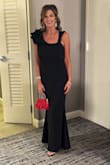 This dress is beautiful. I sized up to a medium and it was very comfortable. The fabric did not wrinkle. The ruffled sleeve was such a statement. I definitely recommend this dress. - Donna B.