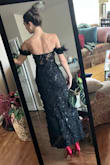 This is so elegant! The corset is stiff and snug. The length is shorter than I expected but hits right at the ankle to show off the heels. Getting the dress was a struggle. Would have been easier with a helping hand. But managed to wrangle myself into it! I was going to wear this for NYE but can't say I'd be able to dance it in. Definitely a gala gown. I'm obsessed. - Cecilia O.
