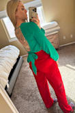 I purchased these red trousers for a party where my business was nominated for Best of the City. They are perfect for Xmas and the holidays also. I got a medium and they fit perfectly. I'm usually a size 6. Get them! - Stephanie C.