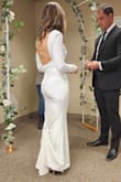 I ordered a small and this dress fit almost perfectly. The bottom was a little long so I used hem tape and bustled the train for a quick, cheap fix! I used fashion tape to keep the top in place and avoided bending over. - Samantha B.