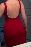 This dress is so beautiful. Got a medium but the bust/chest area was a big too big. Would have sized down but I didn't have time and I think the small would have not fit my hips. I might get the top altered to fit better because this dress is so gorgeous. I will say the stitching that holds the sparkle strip onto the dress seems a bit cheap looking. The clear thread shows in some places. Only noticeable up close but still an amazing dress - Sophie J.