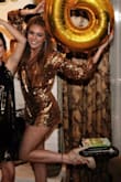 I wore this for New Years. I got the romper so I didn't have to worry about a skirt flying up while dancing. The long sleeves were great for the cold weather outside, although they were a little too short. The sequins can be a little scratchy but it looked great! - Madalyn V.