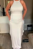 This dress is beautiful and almost fit perfectly. The only alterations I had to have was it was too long. Kept the girls in place. - Sarah S.