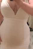 I love it! The zipper does not bunch up and it is very form fitting. Straps are a little long but I'm getting them adjusted to wear without a bra. Fabric is a bit unforgiving with shapewear but I will look for something more seamless. I can't wait to wear it! - DEMETER B.