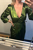 Ugh & I had such high hopes for this dress! The pictures of the model show a beautiful winter green that I was looking for. Instead, I looked like a Christmas tree in the one that arrived is super green and I look ridiculous. So sad because I am only eligible for store credit on this and now will have to find something completely different. - Iwona P.