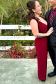 I absolutely loved this jumpsuit! The color, style and material were great. Unfortunately, I am not very tall (I knew this would be too long when I ordered). I did hem the bottoms and cut the straps to shorten the length and sewed them together and it worked out! My only complaint was it was hard to zip up and needed help throughout the night lol. - Heather C.