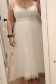 I was so hoping this dress would work for my reception in April. It was a little tight in the chest area but was ok without a bra on. It was the perfect length and I felt like a fairy princess. But...I had to return it. I have eczema which shows itself by being sensitive to some materials and textures. The sleeves and chest/back/torso were not something I could tolerate for more than the 10 minutes I had it on. I tried thinking of several different solutions but with how tight the chest already was, there wasn't a workable solution, unfortunately. - Rachael A.