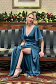 I was surprised about how large it ran. I returned the medium and ordered a size down (small) and it was perfect. I'm 5'9 and the length was great with heels. Had a bit of weight to it. Didn't feel cheap at all. I received so many compliments. Lulus came through for me again! - Jenny Z.