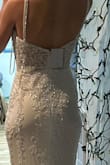 Detail is amazing. It came with a broken hanger so the dress was in a ball at the bottom of the dress bag and it still wasn't wrinkled(at all) when I took it out. If you are traveling / beach wedding I think this is perfect. - Ashlyn T.