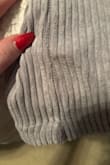 Super bummed because this skirt is so cute and I waited for it to be back in stock so I could order it. I kept seeing ads on TikTok for months and finally ordered it for a Christmas Eve family party 

It fit and isn't a stretchy material but thought that was fine - even though it was tight, it wasn't so tight that it felt like it was going to bust and I've worn form fitting clothes from Lulus before. Was at my family party for a few hours and noticed it was ripping at the seams :( I barely did anything in the skirt, only sitting and standing. 

Later, when I took it off, I saw that it was ripping at both seams! With the one side seam completely ripped at the bottom. So sad because I really liked it and I even modeled my outfit off the model! 

If you have any bigger hips or thighs, size up. Unfortunately, I'm not sure sizing up would fix this skirt for me or other curvy girls as it fits on the waist but the material and non-give of the skirt is the issue and a bigger size would be too large on my waist. - Emily G.