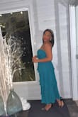 Dress is a bit tight around the bust section and loose around the rib cage. The material is just right and not thin or see through. - Trisha E.