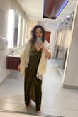 I am 5'8" 150 lbs, athletic build and I ordered a medium and a small. I'm so glad I did because the small fit much better! Fabric is stretchy and comfortable and the style is flattering to all body shapes. The bust runs large but a few pieces of fashion tape kept it in place. The length was perfect with heels. Got lots of compliments; so worth it! - Tia C.