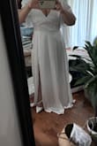 Very nice and pretty, it feels soft and it's simple. I'm 5'2 1/2" and I'm wearing 3.75" heels, would have needed to be hemmed. I bought an XL knowing my bust is large but could have been bigger. Possibly needed a belt to dress it up a bit. Aside from that it wasn't the look I wanted. I returned it. - Nicole P.