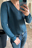 I like the color and the length of the sleeves of the sweater, as well as the fact that it's not secretly cropped in length, but a regular length that keeps you covered in midrise jeans. I like the fact that, even though it looks like it may be made of a heavier material, it's actually very light, thin, airy and really great for warmer temperatures in the autumn and winter that may come up but would also be a great base layer. - Carley Q.