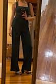 I was on the fence about returning this because I just wish it were a couple inches longer (story of my life!), other than that I think it flatters my figure. This is a me problem though because I'm 6'0 and have extremely long legs. I feel it gives me a bit of a weggie probably because of my long torso. It shows a bit of the bra that I'm wearing in the pic so I'll see if I have a bra with less material in the front or I'll wear my adhesive one. I think I'll keep it anyway because I think I can get away with it. I'm wearing 2" heels in the pic. Maybe I can lower the hem an inch or 2. This is a 34" inseam. Tall girl issues lol. - Nathalie E.