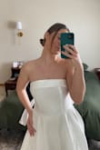 I am getting married in August and wanted to save money on a dress. I looked at countless sites but ended up ordering this one. The quality is thick and satin and I was very surprised that is was not more expensive. It has a sheer/shine to it. I planned on removing the bows to be more simple. I gave a 4 star because it was a bit too shiny for my liking. The bust area fit perfectly and was very flattering. Definitely a good option for a bride on a budget! - Kennedi M.