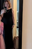 This dress was so lovely and comfortable. Nice thick fabric, very modest in the front with a stunning open back. I wore with heels and a lariat back necklace and got a ton of compliments all evening. - Alexia C.