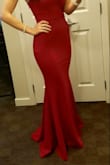 I absolutely love this dress! I was in between sizes XS and S. I am smaller up top so I'm glad I went with the XS. The dress was a bit tight in the hips but not too tight- figure hugging- I expected this based on the size cart. Great material and quality. I needed to have the dress hemmed, but this is typical when I buy long dresses. I specifically had the back of the dress left longer and loved how it looked Overall, amazing dress and it does run true to size. Can't wait to where it again! - Ashley H.
