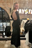 I fell in love with this dress when I saw it online so I didn't want to get my hopes up that it would fit perfectly. But it absolutely did! Fit like a glove! I bought it for a formal New Year's Eve wedding and I got SO many compliments all night long! As well as on these pics I posted to fb afterward. Plus, I snagged it while it was on sale so that was a plus.
The one caveat you should plan for which I was totally forewarned by reading the reviews is that the sparkles do shed like crazy. However, I read one reviewer simply said to wash it and that did the trick for her so I tried that as well and it definitely worked! Not to say that it didn't still shed a little bit but significantly less. I was a bit nervous about it because you have to hand wash it and, while wet, the black sparkles were all over my hands and bathtub. But when it finished drying (or just about) I shook it out and also threw it in the dryer for like 5 -10 mins with a towel to try to get off any remaining loose sparkles. - Lindsay G.