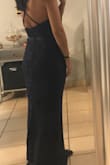 Havent worn it for my event yet. But the dress fits perfectly I need to make no changes. And hides the tummy just a bit. Would totally recommend - Fabiola R.