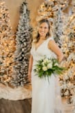 I couldn't have loved this dress more! I was able to overnight ship it and have it altered to fit me perfectly for my special day!! This dress was super elegant and made me feel like a true bride! The simple mesh detail added just enough to my dress to make it feel unique! The material was so comfortable! Highly recommend!! - Natasha F.