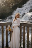 This one was gorgeous. Perfect for my elopement.  I had the sash taken off and added lace to the cuffs for a little extra bridal look and it stunned. Large fit me loose but perfect for the room and how it sat. - Ashton B.