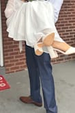 I read the other reviews and ended up getting a half size larger than I usually wear. I'm always a 6 and bought 5.5 and they fit me perfectly. These are very nice shoes and very comfortable, I used them for my civil wedding and could have worn them for like 10 hours. - Ana C.