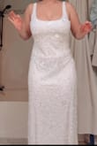 Ordered for my rehearsal dinner and it's STUNNING but I definitely need a smaller size. I run on the larger side of Medium with a bigger bust at 34DDD. More of a shift dress style and the straps were a smidge long. Loved the beadwork and length. I will be ordering in a smaller size! - Claire S.