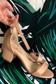 Usually when I buy heels, I can only tolerate wearing them in photos because they hurt so much. With these I had no problem at all wear them the entire night dancing. I'm generally a 6.5 and I suggest sticking to your usual size. If you're looking for cute and comfortable heeled sandals, buy these ones! - Mary W.