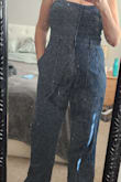 This jumpsuit is beautiful and can be worn on many occasions, summer or winter too. I had ordered an L before, which is usually my size, but it was too small in the waist and didn't close.
 Now I ordered the XL, it's a little big, but I prefer it. - Rachel C.