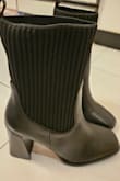 It's a cute pair of mid boots for date night or any event really, the top part slides on like socks the heels are not crazy high either! - Michelle O.