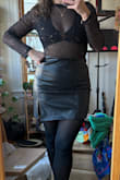 Loved this top! It actually fit very well on top, but was tight around my hips and difficult to snap shut. Not much stretch (which I expected) but was worried I'd rip it trying to get it to snap. It was a great fit on top, though, if not a little big, so sizing up would have made the top too big, I think. I ended up just not buttoning it and shoving the bottom into my tights (hah). - Macullen B.