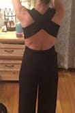 I ordered an extra small based on reviews that it runs big. I needed a small though. It ran up the front of me too tight. I also didn't like the way it looks just the style. Pants too wide and a little long. - Keri N.