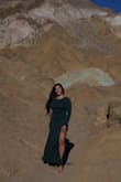Love this dress! Fits perfectly. Both me and my friend shared it for a Death Valley Photoshoot. The color was perfect. Love the slit and the long sleeves. - Jessica V.