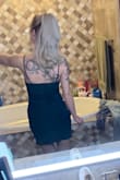 This dress fit perfect and I felt good in it all night. It had a little give so nothing was super tight. The length was decent as well. It looks darker in the picture, it is a teal color. - Amanda S.