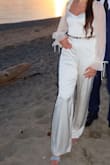 This jumpsuit is so elegant and beautiful. It is such comfortable material and a comfortable wear. I paired my jumpsuit with a nice elegant belt to give it that extra bling! I felt so beautiful and confident in the outfit. It was perfect for my engagement shoot. - Tercia V.